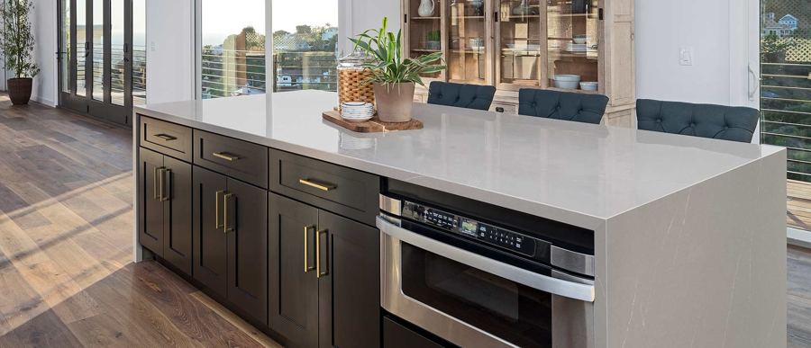 Soapstone Mist quartz surface on a kitchen island